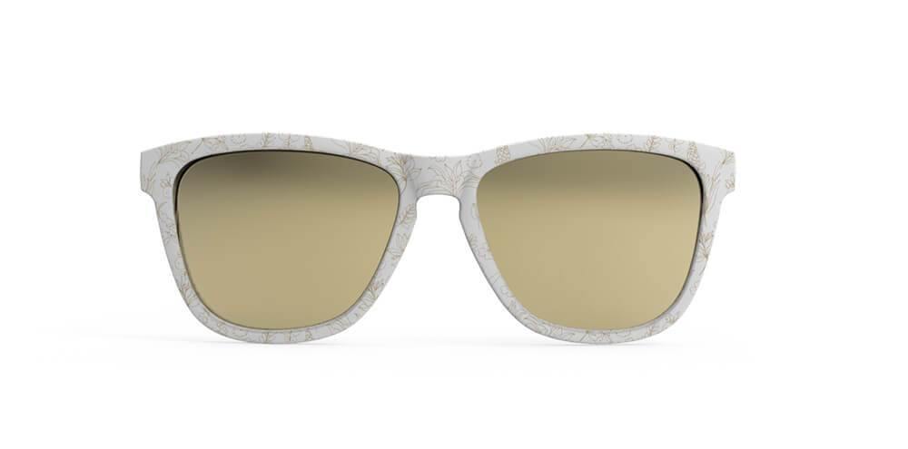 Front view of white shades with gold floral print and gold mirrored UV Protection lenses